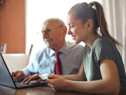 2 people looking at computer